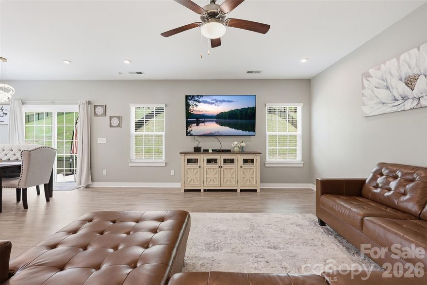 This 5-bedroom, 3-bathroom home is more than just a spacious residence; it is a blend of modern efficiency and thoughtful design, situated in a community that prioritizes both lifestyle and education. 

The kitchen, dining, and living areas flow together, anchored by a chef’s kitchen featuring an updated backsplash and a large central island. This design is perfect for hosting, allowing the family to stay connected with guests in the living room.

Rare for many floor plans, the main floor includes a guest bedroom with a fully tiled bath. This provides a private, accessible space for multi-generational living or overnight visitors without them needing to navigate stairs.

The dedicated office with French doors offers a quiet, stylish environment for remote work. Upstairs, a spacious loft acts as a secondary living zone, ideal for a media room or play area.

Beyond its structure, the home is packed with high-value technical and aesthetic enhancements: 
The inclusion of 20 solar panels and an EV charger in the garage positions this home for lower utility costs and modern vehicle needs.

The oversized primary suite is a true sanctuary, boasting dual vanities, a massive walk-in closet, and a premium tiled shower.

From garage epoxy flooring and custom closets to recessed lighting and updated chandeliers, every detail has been refined for immediate move-in. 

Beyond the community pool, enjoy your own private backyard retreat.

Situated in a high-rated school zone and proximity to local dining and shopping.