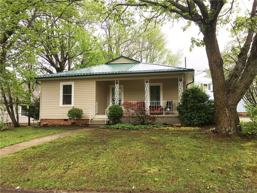 This wonderfully restored 3br/1ba home offers every bit of charm you would expect from the 1920s with the reliability of some very important 2016 updates.  Complete with a new roof, new heat pump, new appliances and new plumbing, this quaint historical home is move-in ready!  It also offers a front/back sitting porch, front/back yard space a 2 story outbuilding and a 10 minute drive to Asheville or Black Mountain.  This perfect home in a revitalized Swannanoa neighborhood is a MUST SEE!
