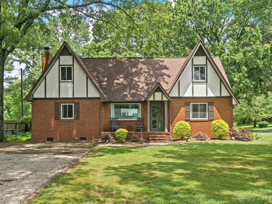 Beautiful, well-maintained Tudor style home. Corner lot, with two separate driveways for the ultimate convenience. This home features beautiful hardwoods on the main floor, including two bedrooms. The large family room features a cozy fireplace. The upstairs features two bedrooms and a full bathroom plus two loft spaces. The owner uses one as an office space. Plenty of room for everyone. The owner has taken pride in their home, and it shows! The updates are endless: NEW hot water heater (2023), NEW garage doors (2023), NEW upstairs carpet (2023), NEW stove (2023), replaced gas pack/heat pump (2018), all windows replaced (2018). The fenced backyard and courtyard area are the perfect spots for entertaining. Your buyers will fall in love with this charming home and the endless possibilities. Showings start 6/24 at 1PM.