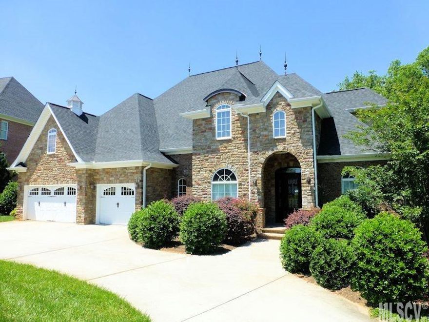 Beautiful and fabulous home located in a lakefront community of NW Hickory...Moore's Ferry! Built in 2008...still feels almost "new"...very well kept. Over 6500 heated sqft!!! Impressive open floor plan offers large rooms & stunning details & upgrades. Great/living room has a gas log FP & opens to the kitchen w/breakfast area. Gourmet kitchen boasts a lrg granite breakfast bar, nice appliances, & huge pantry. Luxurious main level MST bedroom has its own private bath w/WIC, sep.vanities, jetted tub, awesome tiled shower, & water closet. Also, on the main level is a study/LR, laundry rm w/utility sink, half bath, 3-car garage, & screened porch w/access to the deck for grilling. The upper level offers 4 bedrooms and 2 full baths + a huge bonus room. Wonderful lower level is mostly finished(except for a storage rm & some closets)...includes a great/recreation room w/wet bar(wine cooler), full bath, a possible media room, & an exercise room w/mirrors. Circular drive & cul-de-sac location.