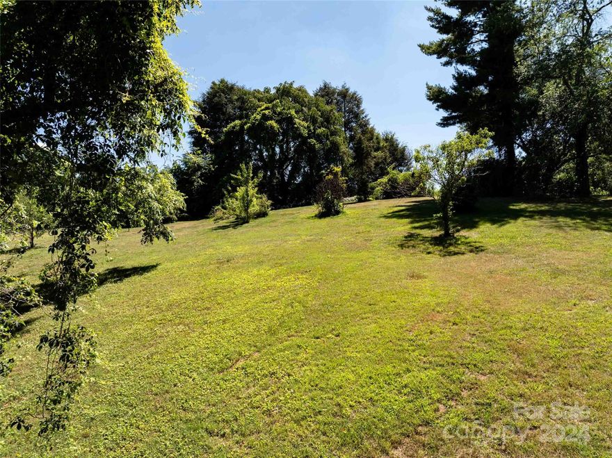 Beautiful west Asheville lot, cleared and ready for your vision.  Property appears to be subdividable and is zoned RM6.  Preliminary survey has been completed and attached.