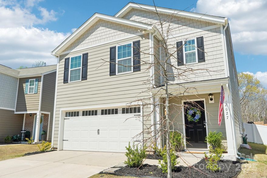 Built in 2023, this spacious residence features 5 bedrooms and 3 full bathrooms.  The heart of the home is its stylish kitchen, adorned with white cabinets and complemented by granite countertops and backsplash. Equipped with stainless steel appliances, including a gas range, microwave, and dishwasher, this kitchen is both functional and elegant. Adjacent to the kitchen, the family room boasts a cozy fireplace with custom built-in cabinets and shelves that create a warm and inviting atmosphere.  The main level accommodates a guest bedroom and a full bathroom, providing convenience and privacy for visitors. Upstairs, you’ll find the primary bedroom along with three additional bedrooms, a hall bath, and a conveniently located laundry room. The primary suite has a huge walk-in closet and spacious ensuite bathroom. Permanent, 4-season holiday lighting on the exterior. The amazing back yard backs to woods and is fully fenced with a deck and lighted gazebo. Assumable FHA loan at 4.99%!