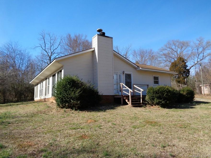 Out of town lots of room. Has a place for a wood heater,three bedrooms, and garage .Large lot, room for out buildings and garden.