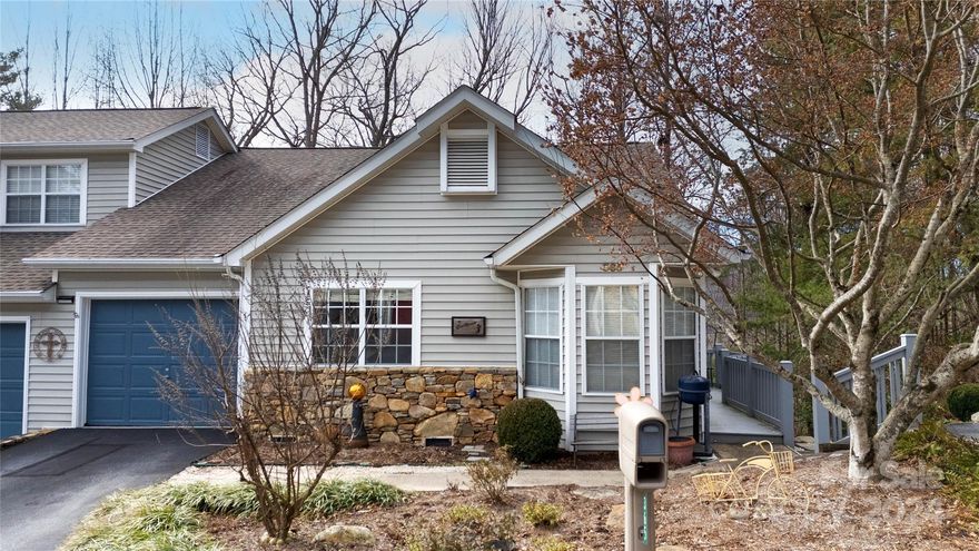 Welcome to this spacious three bedroom, three bathroom duplex on one of the best home sites at the top of Laurel Park Place. With winter views from almost every room, this home is the perfect combination of a mountain feel and modern day comforts. The entire main floor is complete with hardwood floors, two generously sized bedrooms and two tastefully appointed bathrooms. Each room is thoughtfully designed to maximize space and showcase the natural beauty of the area. As you make your way to the basement, a separate living quarters await, featuring another well-appointed bedroom, bonus room and versatile flex space. This additional space provides endless possibilities, whether it be a private guest suite, a home office, home gym or a cozy retreat for relaxation. Ample storage throughout makes this your perfect next move. For more information including neighborhood restrictions, visit the neighborhood website: http://laurelparkplace.org/