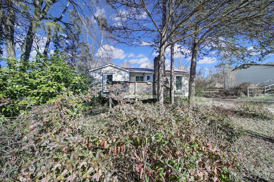 Welcome Home!!  Must See beautifully kept two bedroom ranch! Great open floor plan with a charming living room and spacious kitchen area. Large primary bedroom offers two separate closets. Newer roof, and HVAC. Large tranquil fenced in back yard with shed.  Great Location!  Convenient to everything: Great shopping, restaurants, easy access to 485, and Hwy 74. Don't Miss This Rare Opportunity To Make This Beautiful Home Yours!!