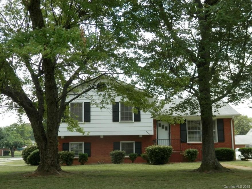 Estate Sale! Great investment property in Historic West End, just minutes away from UPTOWN. One owner, split level home in established neighborhood. New paint in the living room.  Needs some updating and TLC.  Excellent corner lot with mature landscaping. Property includes a small storage building.