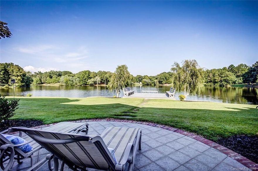 BREATHTAKING, 350' of lakefront privacy! - gorgeous & serene WATERFRONT home nestled on 4 acres. Beautiful architecture, high ceilings, LG crown molding, extensive quality w/unique custom exterior & fine interior craftsmanship. Relaxed bright open FL plan. Den w/FP, KIT w/SS appliances, granite counters, DBL side FP, Sunroom, & much more. Did we mention gorgeous captivating LAKE VIEW? Basement w/multiple entertainment rooms where guest can spill out onto the patio overlooking the water.