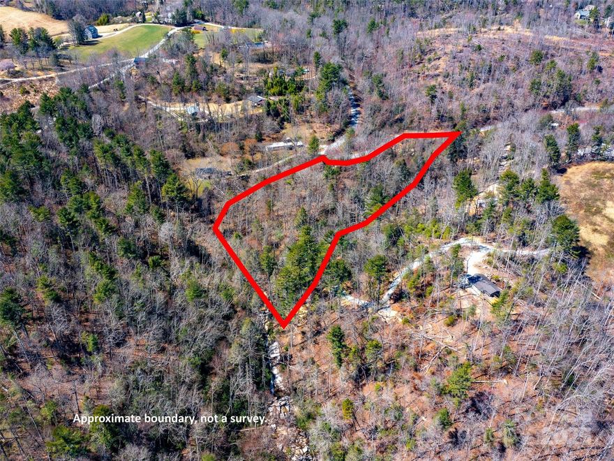 Escape to nature and bring your vision to life on this private 4.27-acre parcel in scenic Flat Rock, NC. Just 10 minutes to downtown Hendersonville and less than 30 to Asheville, this wooded property offers the perfect blend of seclusion and convenience. Enjoy gently rolling terrain, mature hardwoods, and multiple-level build sites. A dry pond bed adds natural character and potential for a garden or water feature. A nearby creek enhances the tranquil setting, and from the back of the property, you can hike directly to the Green River for activities such as kayaking, swimming, or fishing. Zoned R-3 with no HOA or deed restrictions, it's ideal for a full-time residence, weekend retreat, or investment build. Accessed via paved public road; well and septic needed (buyer to verify). Outdoor recreation, dining, and shopping are minutes away. Rare opportunity to build your dream escape in the mountains of Western North Carolina.