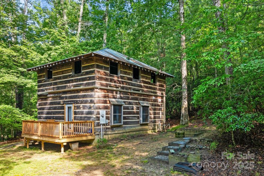 Situated in a wooded setting near Brevard, NC and just moments from the East Fork of the French Broad River, this unique cabin offers a true mountain retreat feel. The warm wood interior, cozy layout, and natural surroundings create the perfect escape. With an additional room ready for expansion, there’s opportunity to customize and grow. Whether you’re seeking a weekend getaway or a base for outdoor adventures, this cabin offers the charm and setting to make it your own.