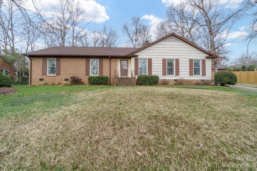 Beautifully maintained and lovingly cared for brick ranch in highly desirable Stonehaven. This 4 bedroom home has so many important major updates: New Roof 2020, Gutters 2020, Windows replaced in 2011, Gaspack 2017, Driveway redone in 2017, PVC Piping 2019, Kitchen Cabinets 2021 with Granite Countertops, Water Heater 5 years old, and updated Vapor Barrier 2023.  Hardwood flooring throughout main living areas and bedrooms. Enclosed carport for extra flex space with separate workroom wired for electricity and can easily be upgraded to all season room with heat/air. Huge 1/2 acre flat backyard.  So many possibilites when you add your personal touch. Stonehaven is a beautiful older Charlotte neighborhood with tree lined streets, rolling hills and lovely homes. NO HOA. Sardis Swim Club is in the neighborhood, separate membership required. Shopping, restaurants, schools, and grocery close by.  15 minutes to Uptown Charlotte.  10 minutes to Southpark.