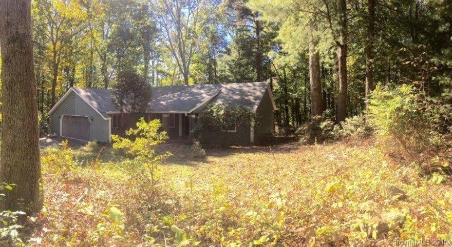 Live in the woods only minutes from town. This fully remodeled 3 bedroom
2 full bathroom home sits on a beautiful .4 acre lot. New bamboo flooring and
new carpet aeate a very warm space, with natural light streaming through.
There is a two car garage, laundry room, master walk in closet, large deck, plenty of storage with a fenced backyard. This house is move-in ready and is set in a quiet neighborhood.