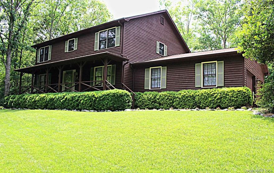Beautifully maintained home on private wooded large lot w/home featuring many updates. 
 Hardwoods, granite countertops, stainless appliances. Home also features GR w/ woodburning fireplace, sunroom(not heated or cooled) New carpet upstairs. 2 car side load garage & much more- Great location Easy to show, call for
appointment