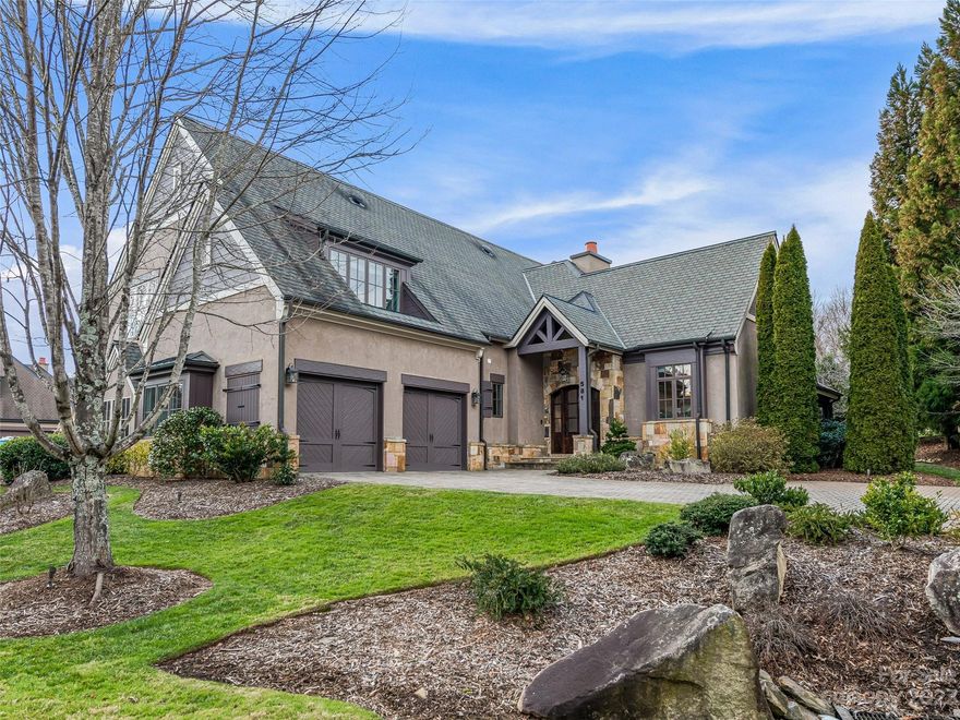 Come home to The Cliffs and step into the serene embrace of The Meadow at The Cliffs in Walnut Cove, where tranquility and world class club amenities define a lavish mountain lifestyle. Whether you desire a permanent residence or a hassle-free 'lock and leave' option, this peaceful townhome seamlessly intertwines mountain charm with refined elements. Recently updated with custom cabinetry and wall finishes, the spacious great room beckons you to enjoy the calming sound and view of a waterfall. Its open-concept layout includes a sizable great room with cathedral ceilings, a chef's island in the gourmet kitchen, a stunning primary suite and outdoor patio equipped with phantom screens. Journey upstairs to find two guest suites and a separate living area for guests' comfort. A Club Membership at The Cliffs is available for purchase with this property giving you access to all seven communities.