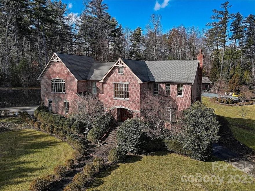 Exquisite estate located in the heart of Historic Flat Rock! There are so many amazing features to this home! Reclaimed antique heart pine floors. Mountain Showcase custom cabinets entire home. Marble and granite counter tops. Slate floors in mud room/laundry room. Custom window treatments. Tons of reclaimed wood and stained glass accents. Custom designed hand made wrought iron railings. Exterior screen porch. Copper gutters and accents. Reclaimed Antique hand hewn mantles and custom doors. Custom Hand plaster and hand glazed walls. Personal automated gated driveway. 1.5 year old generator. Pool with infinity edge, complete with pool house with cedar shingled roof, storage room, stone fire pit and outdoor speakers. Koi pond. Lower organic raised bed gardens. Chicken coop with attached garden shed. 17 year old mature landscapes yard with sprinkler system. Granite window ledges and accents on exterior. Don't miss out on this one-of-a-kind estate!!