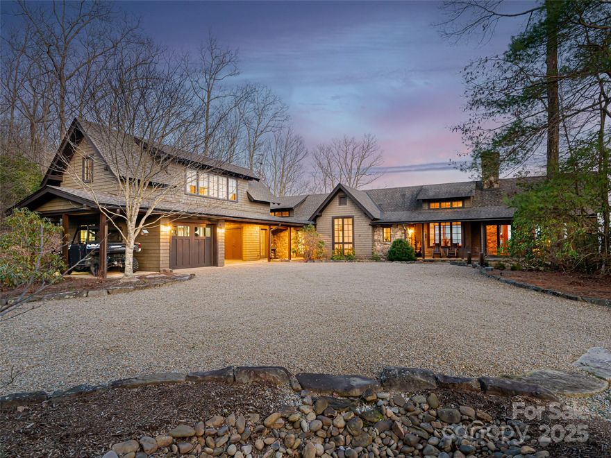 Picture postcard views and a modern mountain masterpiece in the exclusive Richland Ridge Conservation Community is ready for you. This stunning home conceived by Platt Architecture offers breathtaking long-range mountain views from nearly every room. Situated on one of only 25 home sites, this property is surrounded by over 500 acres of permanently protected land & river, ensuring privacy for generations to come. Tastefully curated features include reclaimed wood ceilings and exposed beams, leathered granite countertops and top-of-the-line Viking appliances. A light-filled four seasons room provides a serene space for relaxation or al fresco inspired dining. Retreat to the terrace level where a Finnleo cedar sauna, wine storage, and guest spaces await. Outside, an inviting patio with a built-in firepit and hot tub create the ideal setting for memorable gatherings. A full apartment above the garage offers privacy for guests. Ideally located in Lake Toxaway.