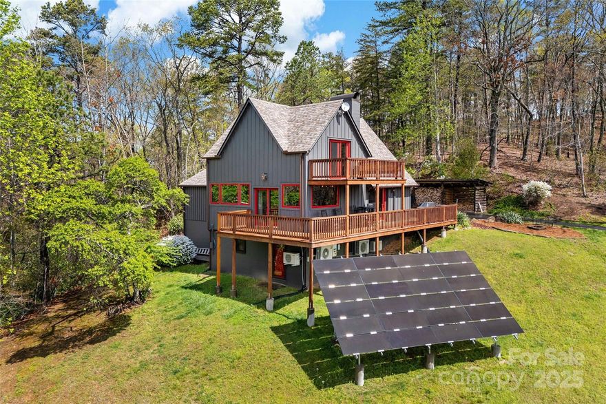 Welcome to 692 Hidden Acres—a one-of-a-kind timber peg home nestled on 4.3 peaceful acres in Marion. This stunning retreat showcases handcrafted timber frame construction, offering warmth, character, and mountain charm. Enjoy sweeping long-range views from the spacious deck, perfect for morning coffee or evening sunsets. Inside, the open floor plan is ideal for both entertaining and quiet nights in. Eco-conscious buyers will love the solar panels, adding energy efficiency to this already impressive property. A large covered parking area easily fits an RV or oversized vehicle, making it perfect for those with a spirit of adventure. With privacy, views, and unique craftsmanship, this home is a rare find in the mountains—don’t miss your chance to make it yours! Do not drive by. Gated private driveway. Fiber Optics Available. 3 bedroom septic.