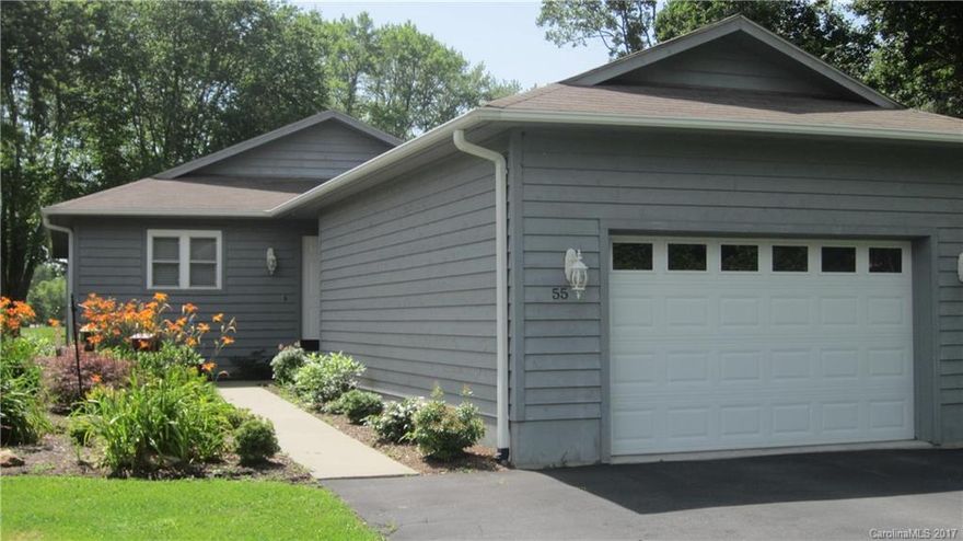 Renovated condo at the beautiful Etowah Valley Golf Club.  Enjoy single level, golf front with green, tee, pond and fountain views from the living room, master bedroom and deck.  Interior is bright with cathedral ceilings and open living with fireplace.  Updates include paint, hard wood floors, fixtures and most appliances.  This is a must see as golf front with updates AND MOSTLY FURNISHED with new furnishings at this price is rare!  Easy access to Brevard, Hendo and airport.  Turn key!