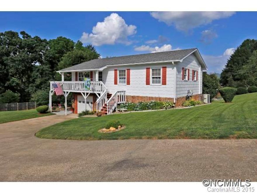 Excellent price and location for this move in ready 3 bedroom, 2 1/2 bath home with updated windows, roof, and HVAC, spectacular level yard, living room, huge family/rec room, large wrap around deck, single car garage in basement, and all at end of cul-de-sac in beautiful small development with like homes.