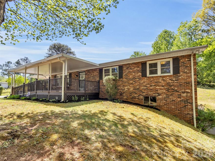 Welcome to this beautifully maintained brick ranch on 1 acre, offering peaceful mountain living with
breathtaking views of the mountains and valley below. Thoughtfully cared for and full of charm, this home
features a full, partially finished basement—providing endless potential for additional living space, a
workshop, office, recreation room, or guest suite. Step onto the spacious covered deck and take in the
cooler mountain temperatures, fresh air, and sweeping natural scenery. Whether you're relaxing with
morning coffee or entertaining friends at sunset, this outdoor space is truly an extension of the home — a
private retreat surrounded by nature. Inside, you’ll find a warm and inviting interior complete with a
gas-log fireplace, ideal for cozy evenings, loads of natural light and beautiful hardwood flooring. The
layout offers comfortable living with classic brick-ranch durability and charm. Located in a quiet,
established area, this property offers the rare balance of tranquility and convenience. From your front
door, a short walk leads directly into National Forest land, where you can enjoy miles of hiking, biking.