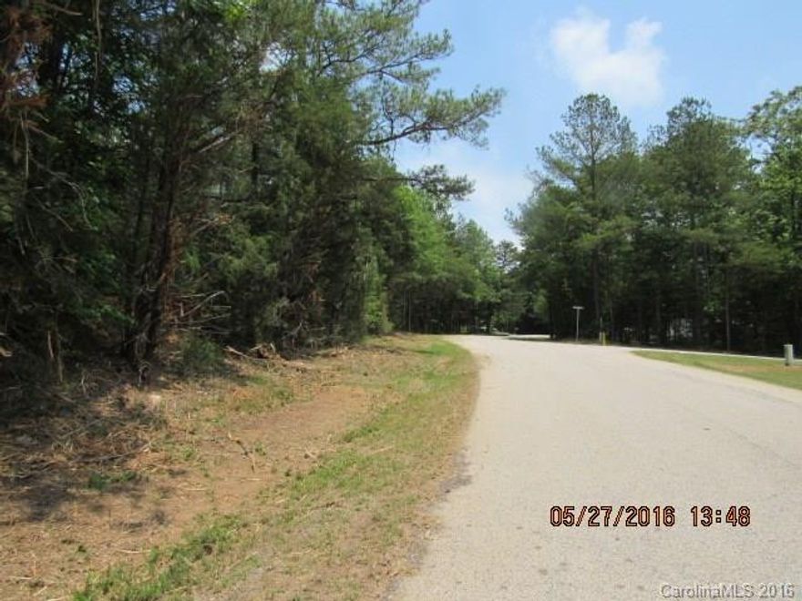 Mobile home approved corner lot, wooded, there is a additional lot next to this one for sale also.