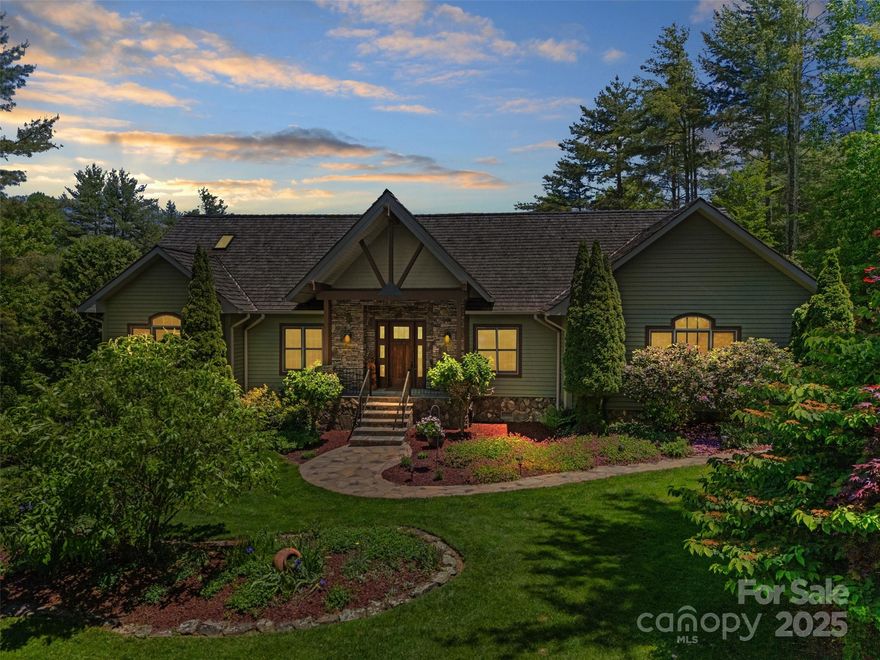 Welcome to this exceptional contemporary mountain-style ranch home, offered mostly furnished and perfectly situated in the prestigious gated community of Valle Cay. The main level showcases a spacious great room with vaulted ceilings and a stunning stone fireplace, flowing seamlessly into a formal dining area, breakfast nook and an upscale kitchen equipped with granite counters, Wolf range, Sub-Zero refrigerator, Bosch dishwasher and abundant custom cabinetry. A private primary suite offers a peaceful retreat, with an en-suite bathroom complete with dual sinks and large walk-in shower, walk-in closet and direct access to the deck and hot tub. The remainder of the main floor is complemented by two guest bedrooms, full bath, laundry room, powder room and access to the oversized two car garage. On the lower level, you’ll find a den, an additional full bath, and a versatile bonus room plus a huge workshop/storage space.Experience a harmonious balance of mountain seclusion and modern luxury