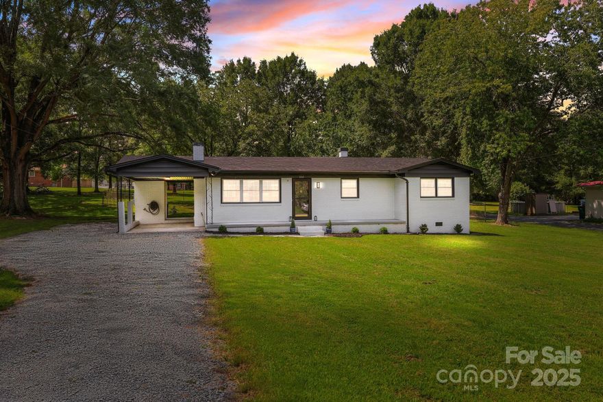 Welcome to your beautifully renovated ranch-style brick home! This 3-bedroom, 2-bath gem has been fully updated and is truly move-in ready. Featuring custom kitchen cabinetry, a gorgeous accent wall with electric fireplace, plus chic mirrors, fixtures, and vanities, this home is filled with stylish upgrades!

Enjoy peace of mind with all new appliances, brand-new washer/dryer, HVAC with updated ductwork, hot water heater, and roof — all recently replaced. Tucked just outside of town in a well-established neighborhood with no HOA, you’ll enjoy both freedom and convenience. Outside, you’ll find an attached carport, fully fenced backyard, and a spacious workshop/storage shed.

This truly one-of-a-kind property combines classic curb appeal, modern updates, and a location that fits your lifestyle. Come take a look — it’s ready to welcome you home!