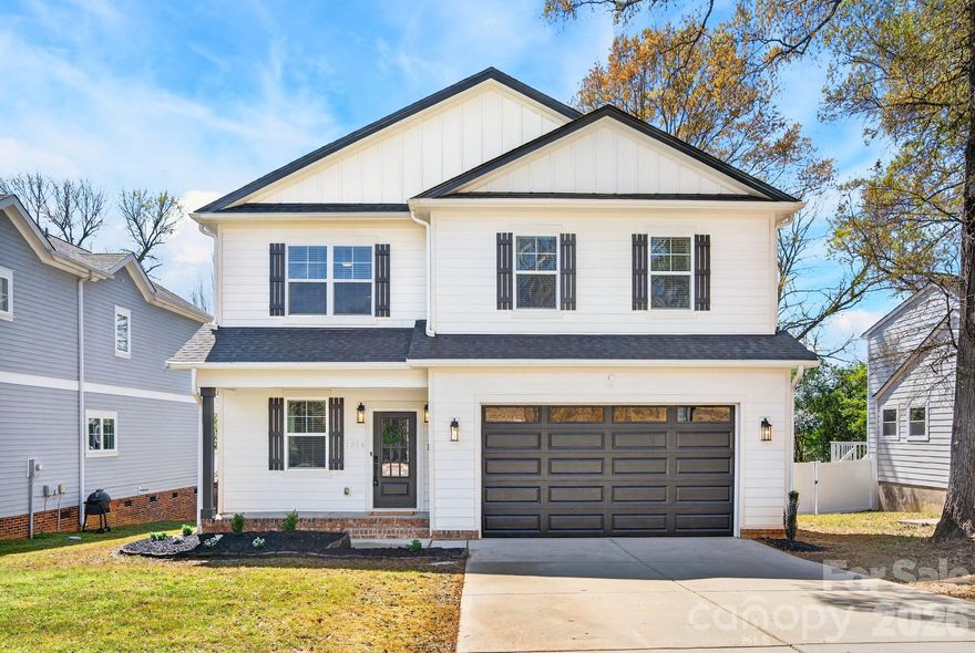 Welcome to 1316 Ordermore Avenue — a beautifully upgraded Dilworth home where the details are dialed in and the location is exactly what people move here for. Set on one of Charlotte’s most iconic, walkable streetscapes, you’re steps from local shops, favorite restaurants, and Freedom Park—so weekend plans can be as simple as a stroll for coffee, a park loop, or dinner close to home.

Inside, the home feels intentional from the moment you enter. The entryway opens to a large flex space that can adapt to whatever you need most: formal sitting room, music room, play space, home office, or a stylish second living area. The finishes and trim work throughout give the home a polished, elevated feel—this is one of those houses where you notice the upgrades and craftsmanship in every room.

The kitchen is the heart of the home and it absolutely delivers. Sleek quartz countertops, upgraded lighting, soft-close drawers and cabinets, and a walk-in pantry give you both form and function. The Cafe brand range is a standout feature for anyone who actually cooks (or just wants that high-end look), and the layout is built for entertaining with a large center island and generous dining area overlooking the fenced backyard. Just off the kitchen, you’ll also love the mudroom setup with built-in seating and storage—perfect for keeping everyday life organized without cluttering the main living spaces.

The kitchen flows directly into the great room, where crown molding, a beautiful gas fireplace set in a custom tiled wall, and abundant natural light create a warm, inviting space that still feels refined. Step outside to the large deck and you’ve got an easy indoor-outdoor setup for grilling, hosting friends, or relaxing at the end of the day.

Upstairs, the primary suite is spacious and bright, with the kind of natural light that makes the room feel airy and calm. The primary bath is truly luxurious with a huge soaking tub, glass shower, dual vanities, and a large walk-in closet. Two of the secondary bedrooms share a Jack-and-Jill bathroom—ideal for siblings, kids, or guests—while another bedroom enjoys its own private full bath, giving you flexibility for visitors or multi-generational living. You’ll also appreciate the upper-level laundry room with built-in cabinets, a sink, and a large linen closet—practical features that make a big difference in day-to-day comfort.

Outside, the fenced backyard gives you a private place to unwind, play, or entertain, and the covered front porch is classic Dilworth—perfect for sitting out with a drink and watching the neighborhood go by.

And then there’s the lifestyle: Dilworth is one of Charlotte’s most loved neighborhoods for a reason. Tree-lined streets, historic charm, Freedom Park at your doorstep, and quick access to Uptown, South End, and the Rail Trail corridor make this location feel connected to everything—without giving up the neighborhood vibe.

This home is move-in ready, thoughtfully upgraded, and packed with the kind of finishes buyers want—paired with one of the best walkable locations in the city.