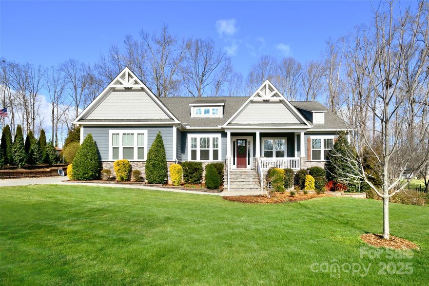 This stunning ranch on .70 acres in Cabarrus County offers a serene location, gorgeous porches, and established landscaping. You'll feel tucked away in the rolling country yet just minutes from bustling Kannapolis and the vibrant Afton Ridge's shopping/ dining options. The first floor flows beautifully and all the rooms live large. Upon entry, be impressed with the private study and lovely formal dining room w/ butler's pantry. The chef's kitchen is truly amazing with updated counters and HUGE island for entertaining. The great room offers built-ins, a fireplace, large doors to the cozy sunroom and is truly the heart of the home. There is a drop-zone, a half-bath, large laundry room, and deluxe garage with epoxied floors. The primary bedroom offers space, large closet, and a luxurious primary bath. On the other side of the home are two sizable bedrooms each with en-suite bathrooms. Outside, enjoy a waterfall feature, a patio, fenced backyard and plenty of room to play. Don't miss it!