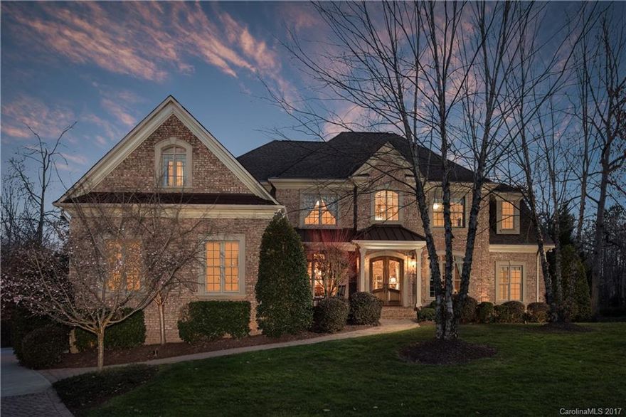Full brick basement home in Victoria Lake!  Features include gourmet kitchen with gas cooktop & griddle, double oven, huge center island, high level granite w/tumbled stone back-splash. 5BR,6.5BA, sun-room, exercise, home theater & billiard/game room,site finished hardwoods on most of main, heavy crown molding throughout.  Master on main w/tray ceiling & sitting/office off master. Exterior features 3 porches for enjoying wooded views,  in-ground  pool w/paved patio, outdoor fireplace & fountain.