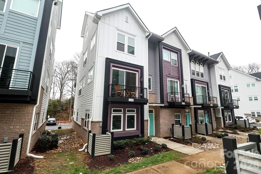 This modern end unit townhome is located in the heart of Noda with wooded views.  This 4 bedroom/ 3 bath townhome features 9 ft ceilings on all floors, a two car side by side garage and 4th floor Flex space / 4th bedroom with powder room and closet that opens to a large Roof Top Terrace with wooded views. On the main floor you will find a beautiful open kitchen with plentiful cabinet space and additional storage in the walk in pantry.  Stainless steel appliances, under cabinet lighting, quartz countertops and ceramic tile backsplash. Vinyl plank floors on the main with stairwells that coordinate with oak treads. All of this and Appliances included, washer, dryer and Refrigerator.  Blinds also are already done for you on the windows.  Don"t miss this one !! Also walking distance to restaurants, bars, coffee and shopping !! Conveniences galore !! If you are looking for a move in ready quick close, this is your home !!