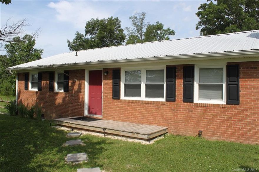 Beautiful brick home on over 2 acres in great location. This home features a large fenced yard, stainless steel appliances, granite countertops, wood flooring, storage building, extra workspace or storage room in home and on and on. Lawn maintenance is included. Don't miss out on this rare find!