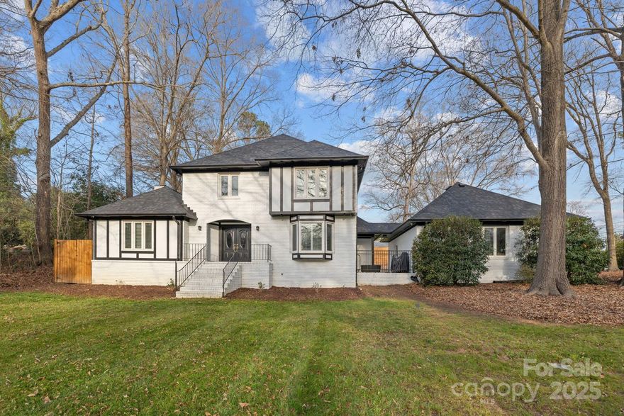 Back on market due to no fault of sellers. Impeccably renovated 3-bedroom, 2.5-bath home on a desirable corner lot in Rock Hill, now featuring brand new front doors with windows that flood the interior with natural light. The gourmet kitchen boasts modern appliances, a potfiller, and elegant quartz countertops. Enjoy an open floor plan enhanced by new hardwood floors and sophisticated lighting throughout. The versatile bonus room is perfect for entertaining, media, or play and could easily be converted into a desirable first floor primary suite. Luxuriate in the primary bath with a soaking tub, expansive tiled shower with multiple heads, heated towel rack, and custom closet organizers. Two additional bedrooms and a full bath complete the upper level. Outdoor features include a brand-new deck, fenced yard, and retaining wall. Additional updates: new windows, roof and gutters, garage door, and freshly poured concrete driveway. 2-car garage with tons of storage and brand new garage doors.