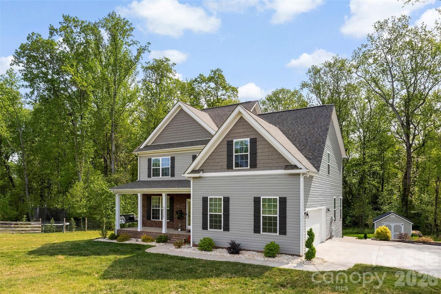 If you've been dreaming of newer construction without the HOA and room to breathe- this is the home for you! Built in 2022 and set on over an acre, this 4-bedroom, 2.5 bath home offers the perfect blend of modern design and peaceful, private living. From the moment you arrive, you'll notice the space- both inside and out- that's getting harder and harder to find this close to town. Inside, the main living areas feel open, bright, and welcoming. The front room offers an optional formal dining space or home office. The kitchen flows seamlessly into the living space, making it easy to stay connected. You'll notice the gorgeous custom build ins in the living room. Upstairs you'll find 4 spacious bedrooms including a relaxing primary suite with your own sitting area, a private master bath, and a large walk-in closet. The 4th bedroom can also be used as a bonus room if desired. Step outside and you'll really see what set's this home apart. The covered lanai is the kind of space you'll use year-round- morning coffee, evening dinners, or just taking in the peaceful surroundings. You also have an uncovered deck space, perfect for grilling! Underneath the home, the sellers have added extra storage space and there is a separate shed to store your lawn mower and outdoor accessories. The outdoor space gives you the freedom to create the lifestyle you want- think gardens, maybe a pool, or anything else you can dream of! Less than 10 mins from downtown Waxhaw, close to shopping & dining, plus top-rated schools, this home offers it all- convenience plus space. Come check it out today!