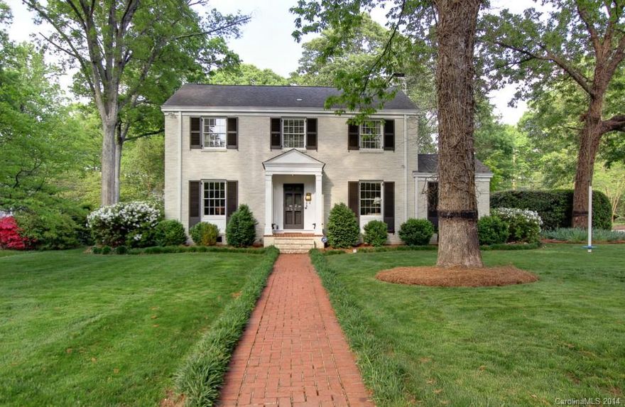 Charming two story brick home on great Myers Park street.  Beautiful formal living room with FP.  Formal Dining. Den/Study w/ FP.  Updated eat-in kitchen open to great room w/high ceilings and FP.  Covered porch.  Master suite w/ walk in closet w built ins and large bath.  Three additional bed/bath suites. Office. Playroom up w/ half bath.  Two car attached garage. Large, private, fenced backyard.  Show and sell!