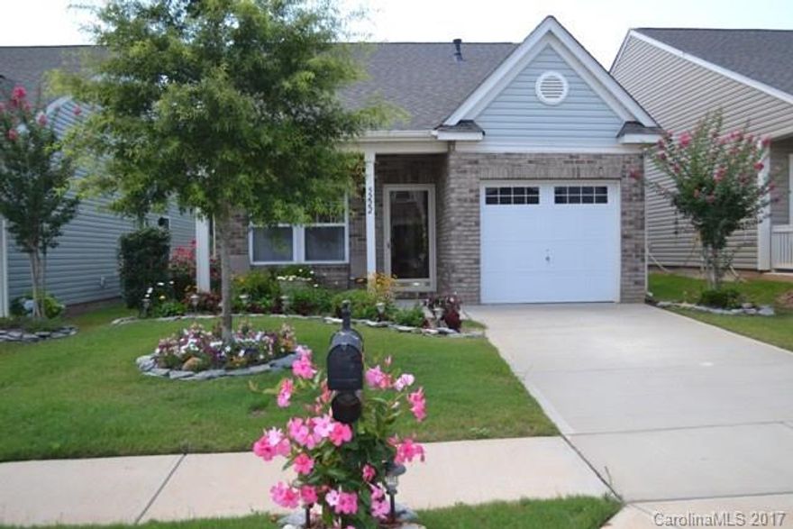 This cottage style home located in Crystal Lakes shows like a model home!  You will enjoy the rocking chair front porch and screened back porch.  Spacious great room, granite kitchen with large breakfast bar and eating area.  Two good size bedrooms and baths.  Prepared to be impressed.