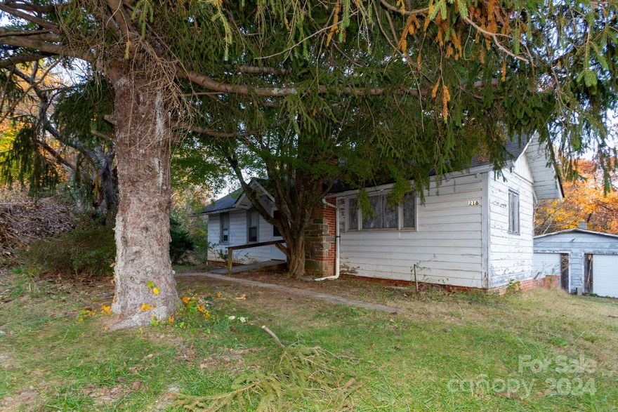 Great potential and perhaps a couple extra building lots in Grovemont.  The house needs remodeling but did NOT suffer any damage in the recent weather.  City water and sewer.  Great place to call home.