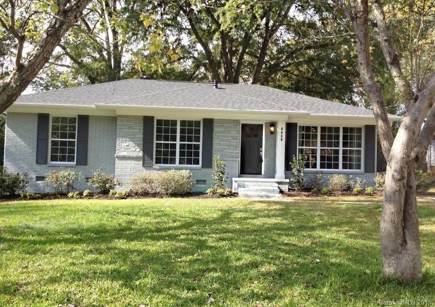 Stunning transformation of classic brick ranch with new open floor plan, gorgeous hardwoods and great deck. Beautiful, tall windows fill this house will natural light. Huge master bath. Designer touches throughout. This place will knock your socks off.