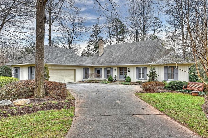 Fantastic living space in this beautiful Huncliffe home. Sunken great room w/vaulted ceiling & gas fireplace. Handsome den/study w/woodburning fireplace & custom cabinetry. Spacious dining room. Sunroom w/skylights. 3BR, 3 baths & 2 half baths. Master w/2 full baths & custom closets. Eat-in kitchen features granite, HWF, double ovens & island w/gas cooktop. Mud room large enough for laundry & home office. Great curb appeal, private/low maintenance yard, and desirable South Park neighborhood.