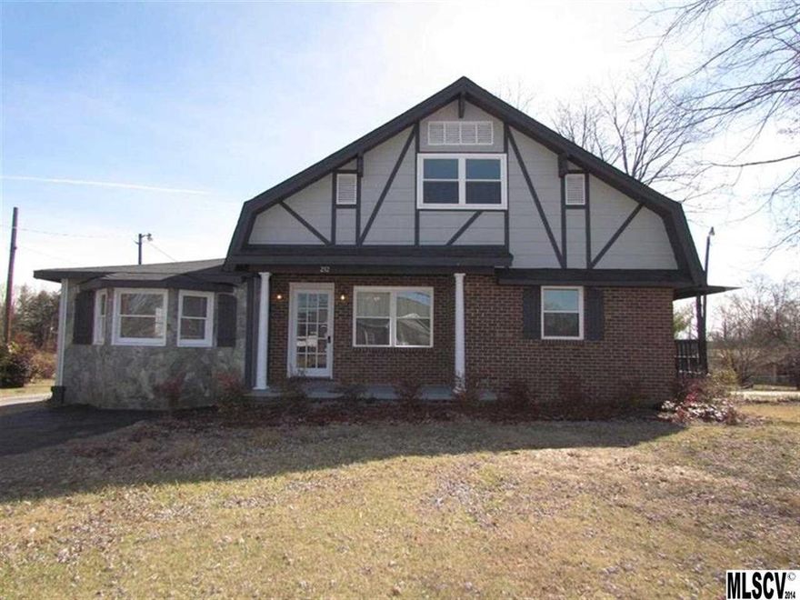 Bring offers. This great home has had many updates including new roof (2013), updated windows (2013), new hot water heater (2013), flooring and fresh paint throughout (2013). This 4 bedroom, full bath & 2 half bath home offers lots of space, beautiful hardwood, ceramic tile, & carpet flooring.  Great living room & large den with a fireplace allows you to spread out and entertain. The large open kitchen features stainless steel appliances, a large sink, and a great dining area with new updated windows to look out while dining. Located on the main level are master bedroom & half bath, full bath, bedroom 2, & upstairs is bedrooms 3, 4, & another half bath with lots of extra storage space. There is a great front porch, large covered deck on the side and exterior access to the basement. Located close to US 321 and downtown, don't miss your great opportunity to get into this great home.