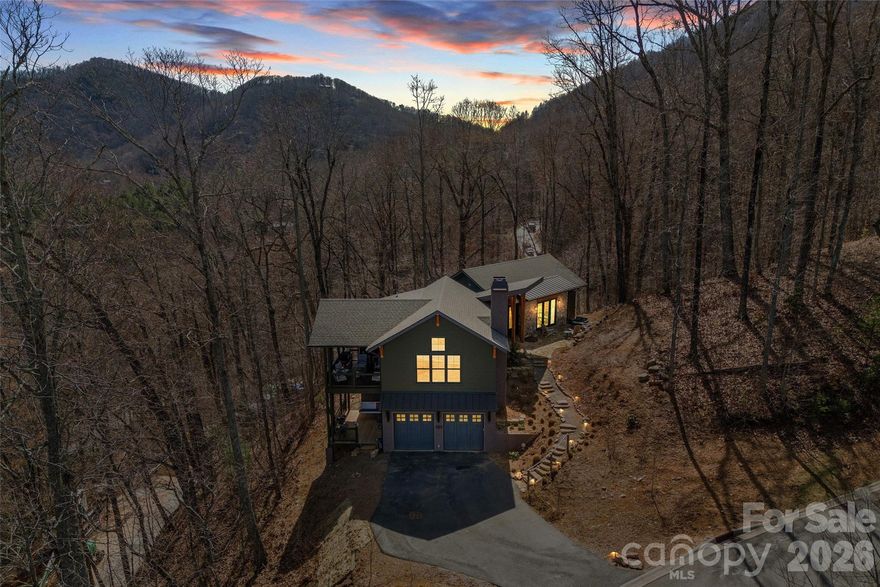 Price Improvement – Don’t Miss This Opportunity!!!!! Welcome to this luxurious custom built home at 159 Settings Blvd in The Settings of Black Mountain! This property boasts 2521 sqft of living space, including 3 BR-2.5 BA and views to the highest mountains east of the Mississippi. Upon entering the home, you'll be greeted by the beautiful and spacious main level, perfect for entertaining guests or simply relaxing. The kitchen has custom cabinetry/storage that is both functional and a work of art! The primary bedroom is conveniently located on main, providing easy access with a connecting office/den. 2 bedrooms and 1 full bath can be found on the lower level, along with a kitchenette. Large 2 car garage with 1005 unheated sqft workshop, provides space for vehicles and projects. The exterior of this gorgeous home is just as impressive as the interior, with large porches, patios and decks perfect for enjoying the beautiful NC weather. The attention to detail and craftsmanship of this home truly make it one-of-a-kind. Don't miss out!