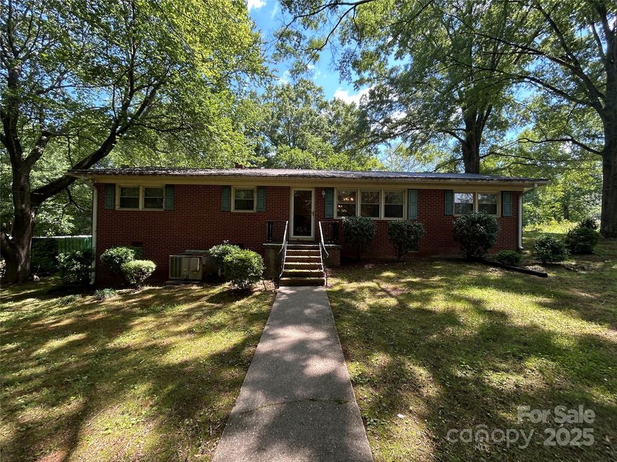Welcome to this well-maintained 3-bedroom, 1.5-bathroom brick ranch! Perfect for first-time buyers or anyone looking to downsize, this home sits on a spacious corner lot in a convenient location close to restaurants and shopping. Outdoor access leads to the basement/crawl space, offering excellent storage or potential for a workshop.  With a little love and your personal touch, this property has the potential to truly shine. Don't miss the chance to make it your own.