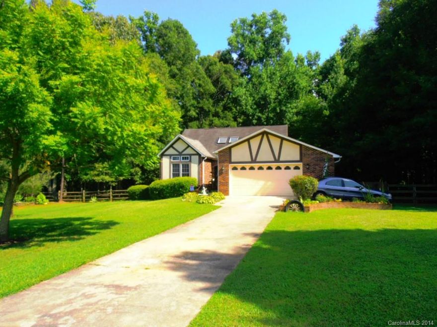 If you have been looking for a brick ranch on an acre with a two car garage, YOU MUST SEE THIS ONE.  This home features a vaulted ceiling with skylights and gas logs in the fireplace in great room.  It is open to the kitchen and dining room.  Master suite features a large garden tub and separate shower.  Deck and screened in porch overlooks wooded backyard.  Call listing agent for details!