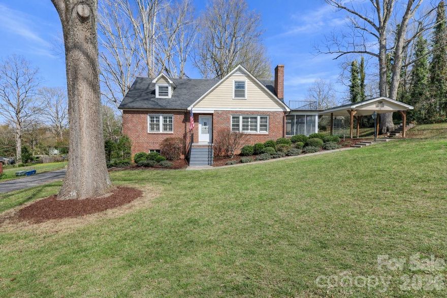 Charming 1951 1.5-story home with basement nestled on nearly .71 acres in established Hickory! This spacious 5-bedroom, 2.5-bathroom home blends timeless character with thoughtful updates and flexible living space.

Beautiful wood floors, plantation shutters, and a cozy gas fireplace create a warm and inviting main living area. The layout offers room to spread out, with multiple bedrooms ideal for guests, home office needs, or crafting spaces.

Enjoy quiet mornings or relaxing evenings on the screened porch overlooking the expansive yard and beautiful landscaping. The partially finished basement offers excellent flex space for a den, recreation room, or bonus area — and the pool table in the basement den will remain with the home, making it move-in ready for entertaining. An additional unfinished storage/workshop area provides space for hobbies, projects, or extra storage.

Recent improvements include a roof (2015, previous owner), new heat pump & HVAC (2023, previous owner), water filter system in kitchen(2023), Lorex security system and doorbell camera (2023), WIFI thermostat(2023), fresh paint throughout(2023),  and new hardwood floors in downstairs hallway for added peace of mind. LeafGuard gutter protection offers low-maintenance convenience. Washer, dryer, and refrigerator convey. The upper driveway features a carport with electricity, offering covered parking and convenient access to power for tools, hobbies, or additional outdoor functionality. A secondary lower driveway provides even more parking and accessibility.

Located in an established area of Hickory known for its mature trees and classic homes, this property offers convenient access to downtown Hickory, local dining and shopping, parks, and major roadways for commuting. Enjoy the charm of a well-loved neighborhood while still being just minutes from everyday amenities.