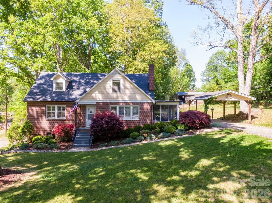 Charming 1951 1.5-story home with basement nestled on nearly .71 acres in established Hickory! This spacious 5-bedroom, 2.5-bathroom home blends timeless character with thoughtful updates and flexible living space.

Beautiful wood floors, plantation shutters, and a cozy gas fireplace create a warm and inviting main living area. The layout offers room to spread out, with multiple bedrooms ideal for guests, home office needs, or crafting spaces.

Enjoy quiet mornings or relaxing evenings on the screened porch overlooking the expansive yard and beautiful landscaping. The partially finished basement offers excellent flex space for a den, recreation room, or bonus area — and the pool table in the basement den will remain with the home, making it move-in ready for entertaining. An additional unfinished storage/workshop area provides space for hobbies, projects, or extra storage.

Recent improvements include a roof (2015, previous owner), new heat pump & HVAC (2023, previous owner), water filter system in kitchen(2023), Lorex security system and doorbell camera (2023), WIFI thermostat(2023), fresh paint throughout(2023),  and new hardwood floors in downstairs hallway for added peace of mind. LeafGuard gutter protection offers low-maintenance convenience. Washer, dryer, and refrigerator convey. The upper driveway features a carport with electricity, offering covered parking and convenient access to power for tools, hobbies, or additional outdoor functionality. A secondary lower driveway provides even more parking and accessibility.

Located in an established area of Hickory known for its mature trees and classic homes, this property offers convenient access to downtown Hickory, local dining and shopping, parks, and major roadways for commuting. Enjoy the charm of a well-loved neighborhood while still being just minutes from everyday amenities.