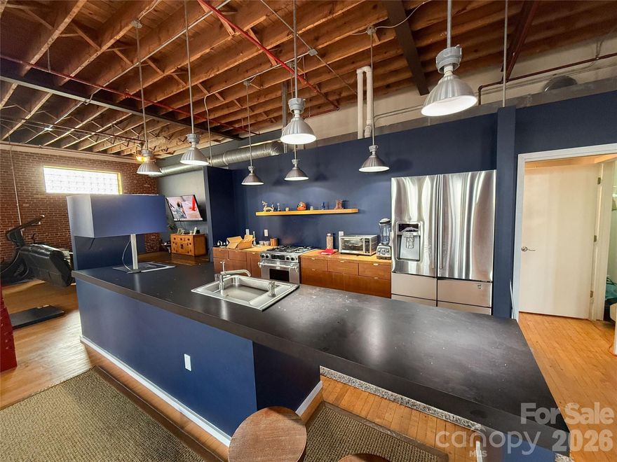 Contemporary mixed-use property in historic Downtown Salisbury offering approximately ±10,000 SF and exceptional flexibility. Zoned DMX – Downtown Mixed-Use, this property allows for a wide range of commercial, residential, or live/work uses.

The building features expansive open spaces across multiple levels, a beautiful top-floor loft, and a freight elevator. The layout has been approved to be divided into up to three separate spaces, making it ideal for investors, owner-users, or redevelopment.

Additional features include a two-car garage, rear alley access, strong architectural character, and close proximity to restaurants, retail, offices, and cultural destinations. HOA in place with no HOA dues. Free public parking nearby with 2-hour business parking available.
Also listed as commercial MLS# 4343142

Prime Downtown Salisbury location with excellent visibility, access, and redevelopment potential.