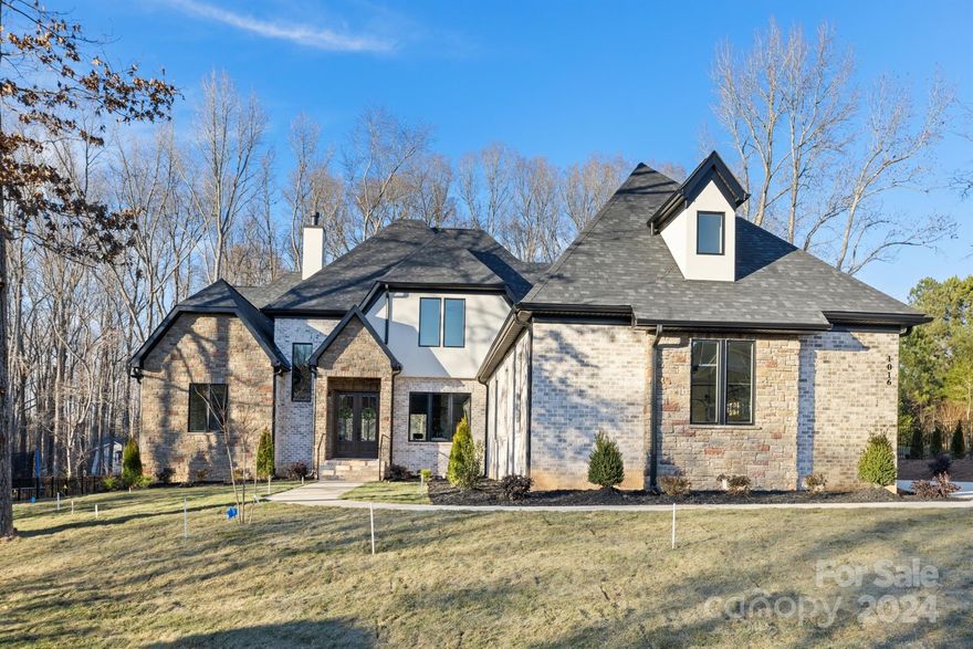 Welcome to this beautiful new built home in desirable Waxhaw location. Custom cabinetry, high end appliances, a large island, pantry and coffee bar area make this a dream kitchen for entertaining. The great room has custom beam work, gas fireplace, built ins & expansive sliding glass doors that open to a gorgeous outdoor living area. Spacious primary suite on the main features luxury bathroom, & custom closets! Office and laundry are also conveniently located on the first floor.  Upper level offers 3 bedrooms with ensuite baths, bonus room & and an additional large rec/game room with a custom wet bar. The custom features, beauty and location of being just minutes from Waverly and I485 is one you won't want to miss.