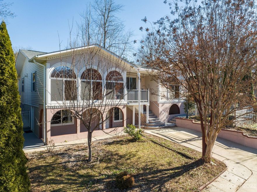 Well-appointed home in Oakley area of Asheville! Endless possibilities–potential income-generating opportunity or an in-law suite. This 5 Bedroom 2 full & 2 half bath residence is a gem, offering versatile living spaces. Step inside and you'll be greeted by a large living area, perfect for entertaining guests or enjoying cozy nights. The living area is adorned with beautiful windows, allowing an abundance of natural light, creating a warm atmosphere. Main level features a bonus room, perfect for a den or office. Property offers its own garden and private patio area in back. Lower level is a treasure featuring a 2nd living qtrs. This self-contained space has a equipped kitchen, huge living room, bedroom, and 1 1/2 baths, perfect setup for guests or tenant. Located in a prime city location, this home is just minutes away from downtown Asheville. Additional 507 sq.ft. (although heated) not counted in 2nd Living Quarters (Basement) square footage because ceiling height is below 7 feet.