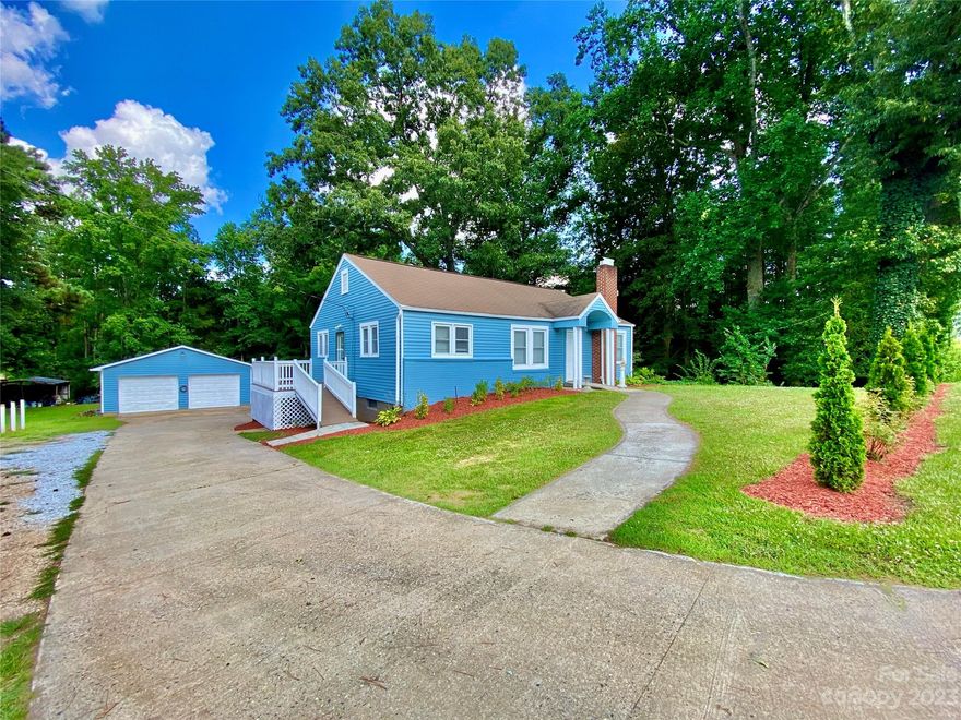 Beautiful home on large lush yard with trees & shade. Large bedrooms, spacious living room & dining room. Home has many updates including granite counters in kitchen with beautiful backsplash. New laminate flooring, fresh paint inside and out. Stainless steel appliances, built-ins in dining room, main bathroom also has new granite counter top. Home is perced for 2 bedrooms. Unfinished basement has approx. 1094 sq. ft. which includes approx. 177 additional sq. ft. (917+177=1094 approx total sq. ft.)  Lots of possibilities for craftroom/workshop.  Basement also has access to back yard. Large driveway that extends to detached garage & behind property great for cook out/barbeque & entertaining. Lots of room to run & play sports. It won't last long!