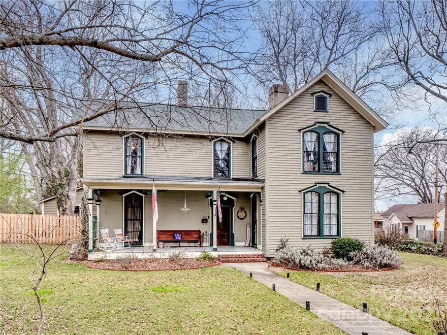 Wow! What a beautiful, unique two story home in downtown Salisbury. This incredible, historic home has so much character! Enter through the large front porch to a foyer and beautiful staircase. Main level has primary bedroom and full bath. A large dining room and living room that could be interchanged to suit your needs. Spacious, updated kitchen with marble counter tops and plenty of cabinets for storage. Laundry room right off kitchen. Back door leads into mud room. Upstairs you will find a full bathroom with a lovely sitting area attached. Three large bedrooms with plenty of room for furniture. Original floors and carefully crafted, hand-painted walls! Outside you will find a fully fenced yard. Sellers installed back fence in May 2022. Could be stained to color of your choosing! Lovely two car detached garage built in 2020.