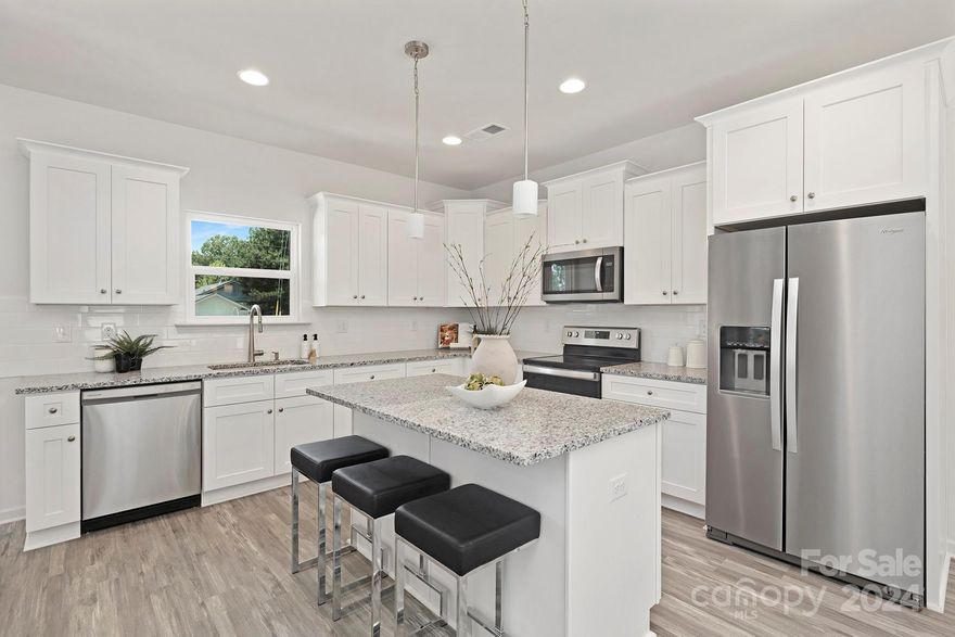 Step into the newest gem crafted by Northway Homes! This remarkable construction harmonizes comfort and elegance, featuring 3 bedrooms and 2.5 bathrooms. Positioned near the tranquil Hornets Nest Park, it epitomizes a blend of serenity and luxury. Upon entering, you're greeted by exquisite flooring spanning the entire first floor, facilitating fluid movement throughout. The centerpiece of this residence is its expansive, open-concept layout, perfect for entertaining gatherings with loved ones. The primary bedroom serves as a peaceful sanctuary, boasting an en-suite bathroom designed for indulgence and relaxation. Upstairs, two additional bedrooms share a meticulously designed bathroom, ensuring ample space for family or guests. Seize the opportunity to own a home that seamlessly integrates modern living, comfort, and a premier location, all in one irresistible package.